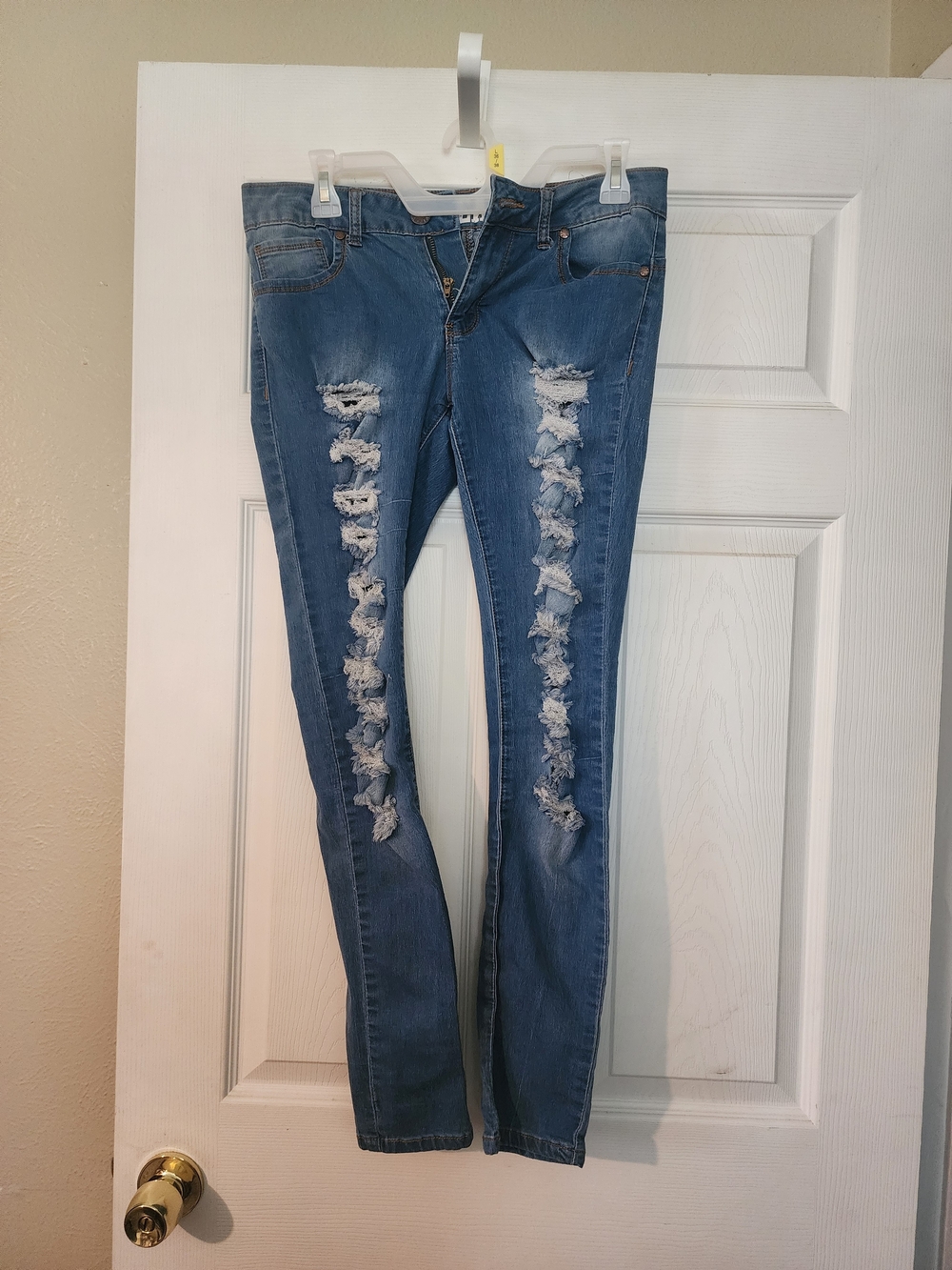VIP Distressed Skinny Jeans in Medium Blue
